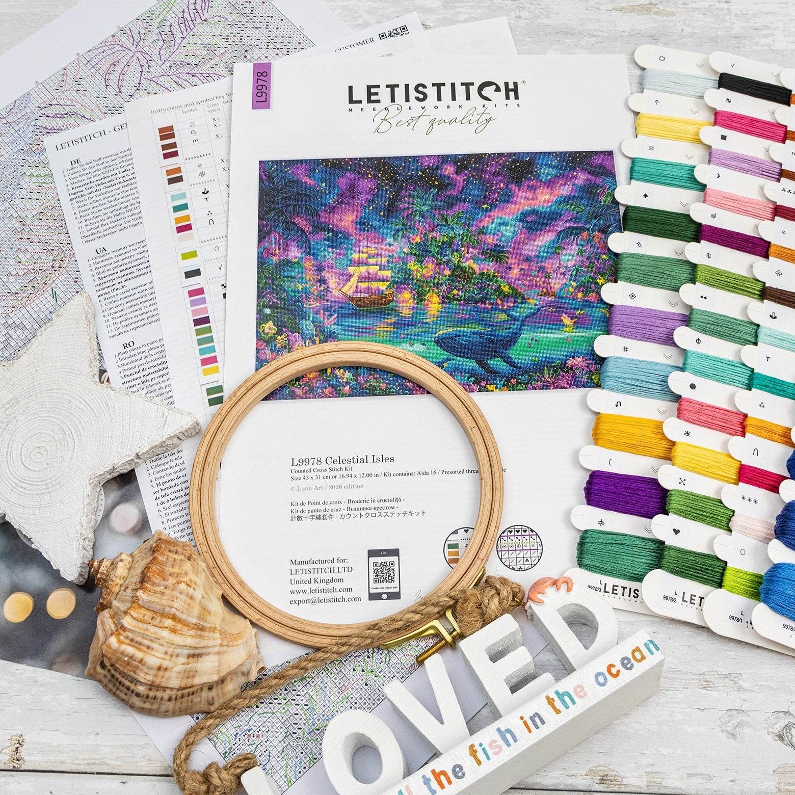 Celestial Isles Cross Stitch Kit with 16 count white Aida fabric and pre-sorted cotton threads