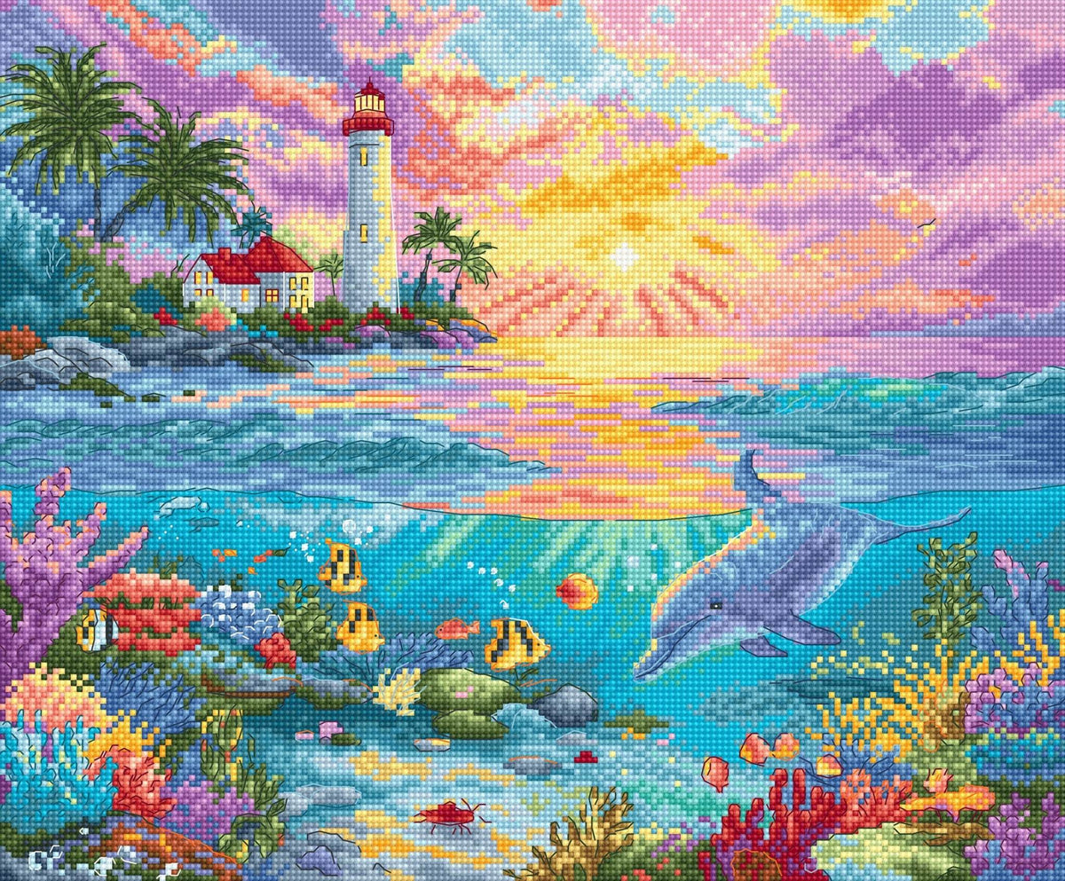 Dolphin's Paradise Cross Stitch Kit with 16 count white aida, pre-sorted cottons, needle, and instructions