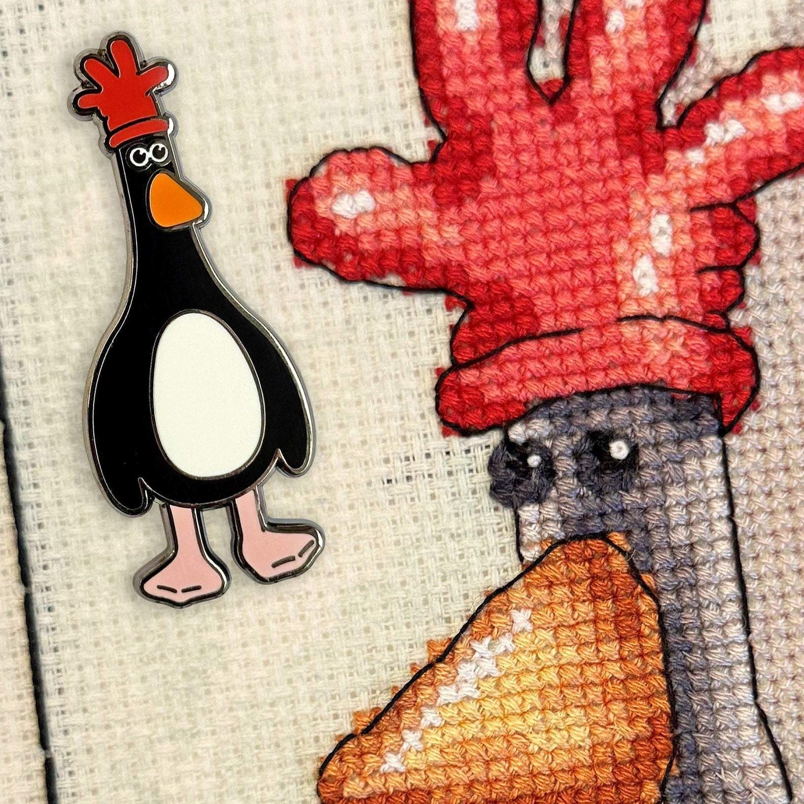 Magnetic needle minder with feather design for fabric and charts, 2cm by 5cm