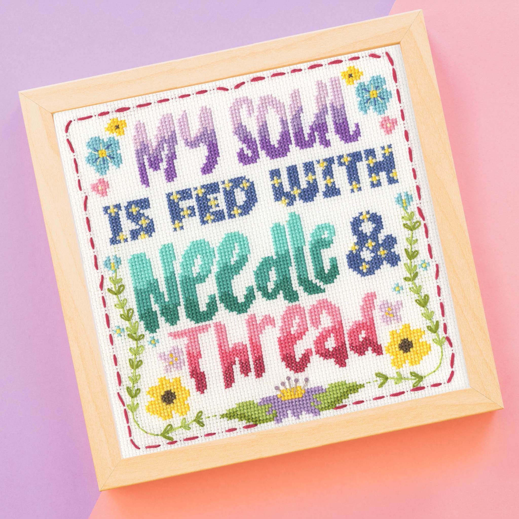 Needle and thread cross stitch kit with 14 count white Aida cloth and sewing supplies