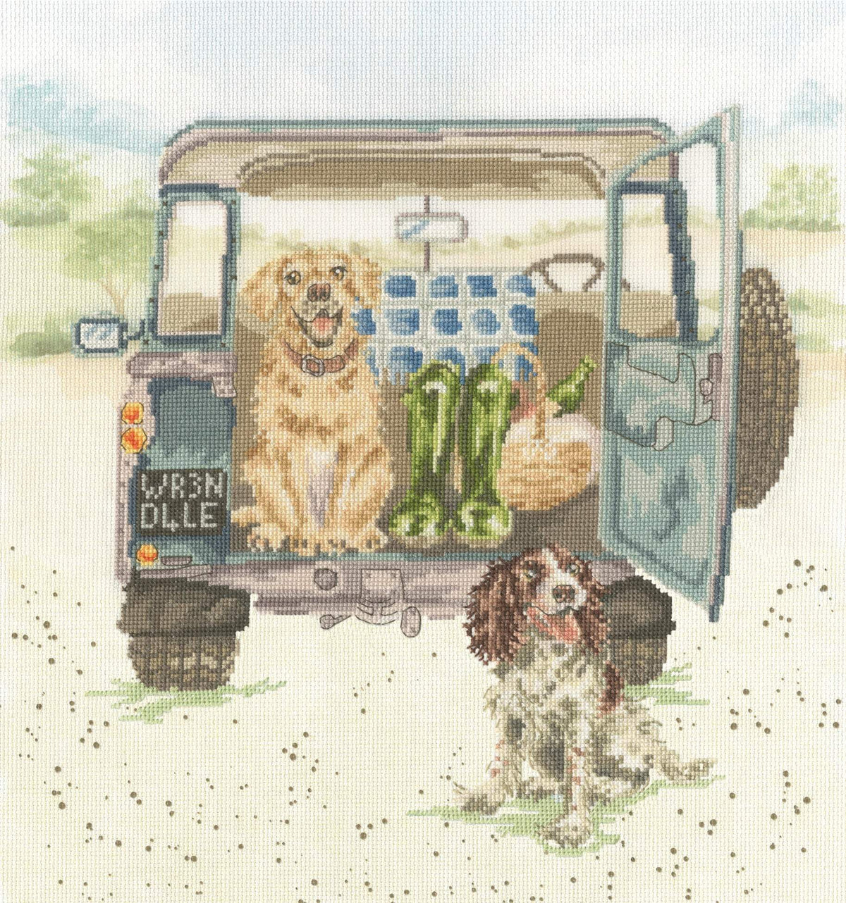 Paws For A Picnic cross stitch kit by Bothy Threads with colorful fabric, cotton threads, needle, and instructions