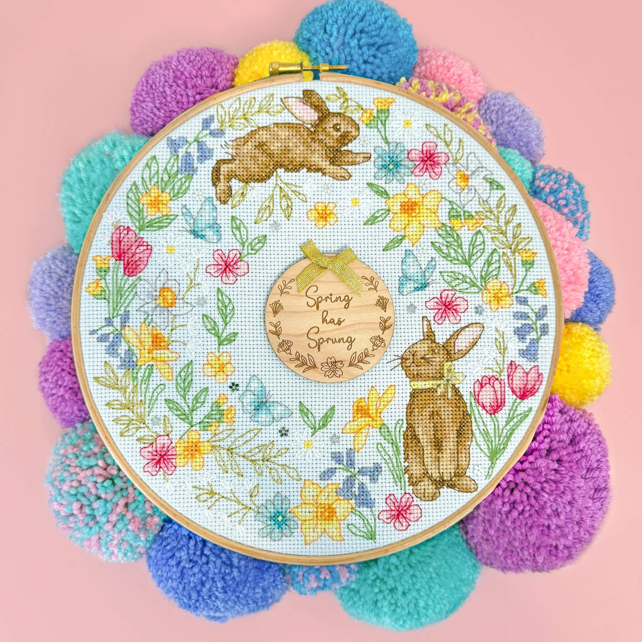 Spring Wreath Cross Stitch Kit with 14 count ice blue Aida, gold thread, sequins, and wooden Christmas disc