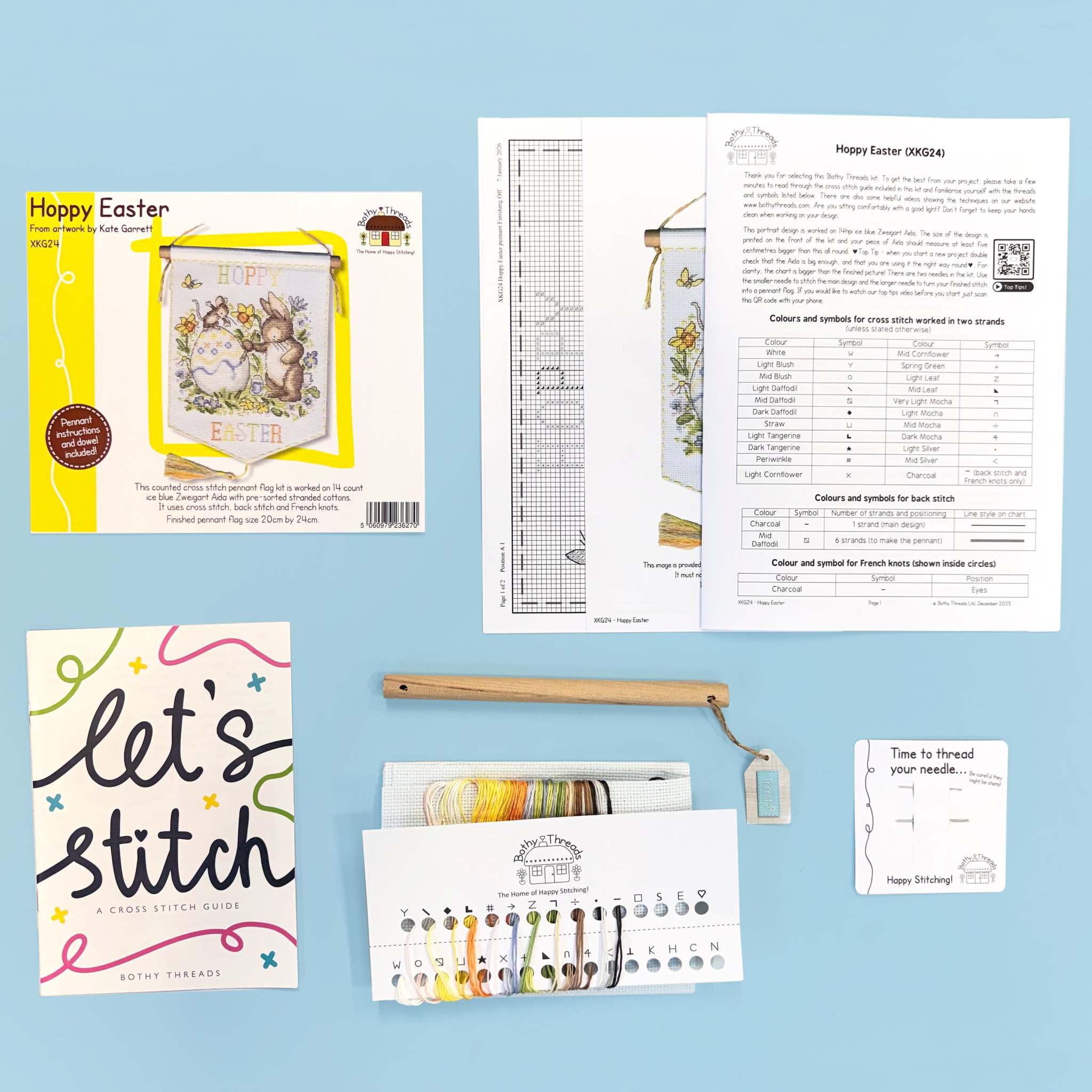 Hoppy Easter Cross Stitch Kit with ice blue Aida fabric, cotton threads, needle, dowel, and instructions