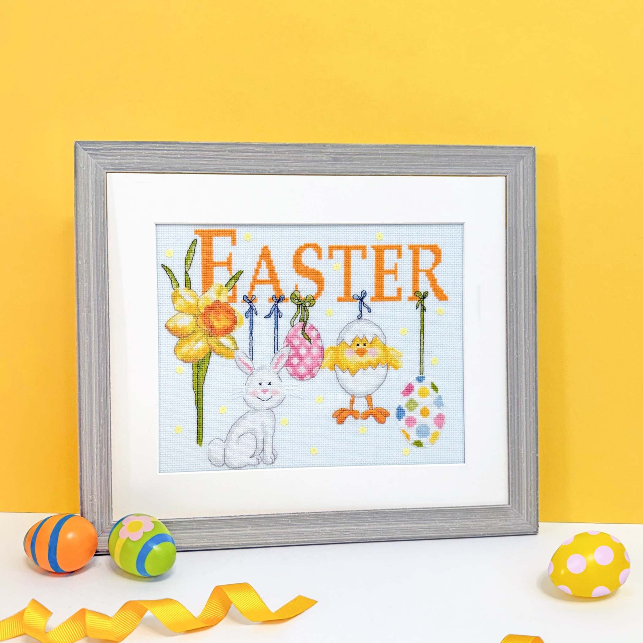 It Must Be Easter cross stitch kit with ice blue Aida fabric and yellow sequins