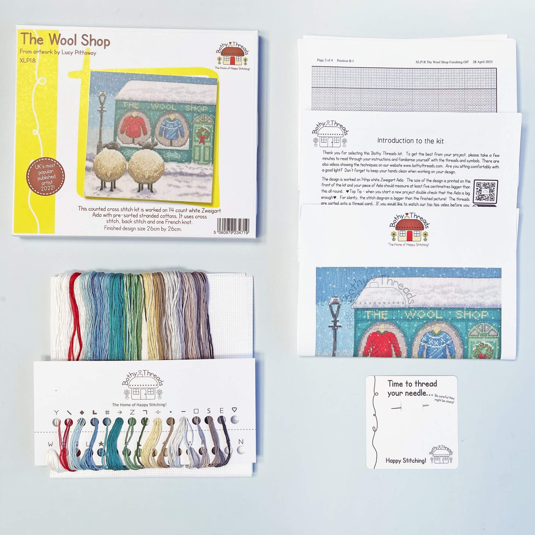 The Wool Shop cross stitch kit with 14 count white Aida fabric and pre-sorted cotton threads
