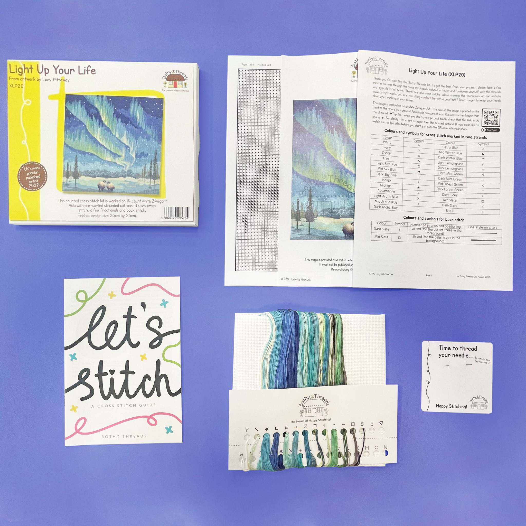 Light Up Your Life cross stitch kit with 14 count white Aida, cotton threads, needle, and instructions
