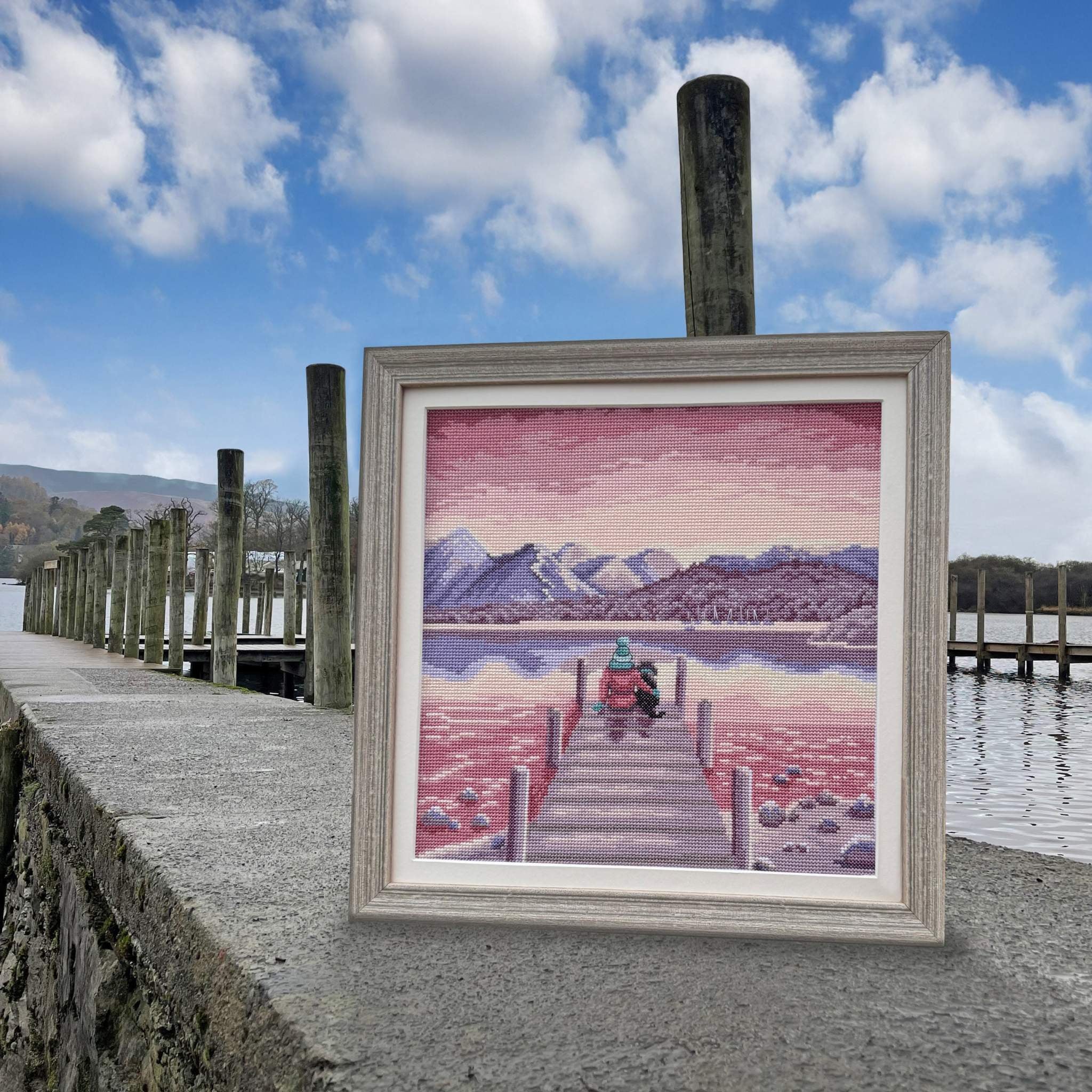 A Pawfect Place cross stitch kit with a dog by the water on 14 count Aida fabric