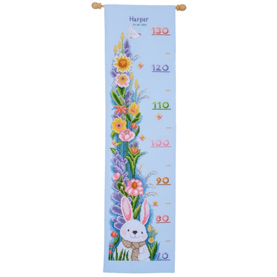 Rabbit in garden height chart cross stitch kit on light blue aida fabric with DMC cottons and needle