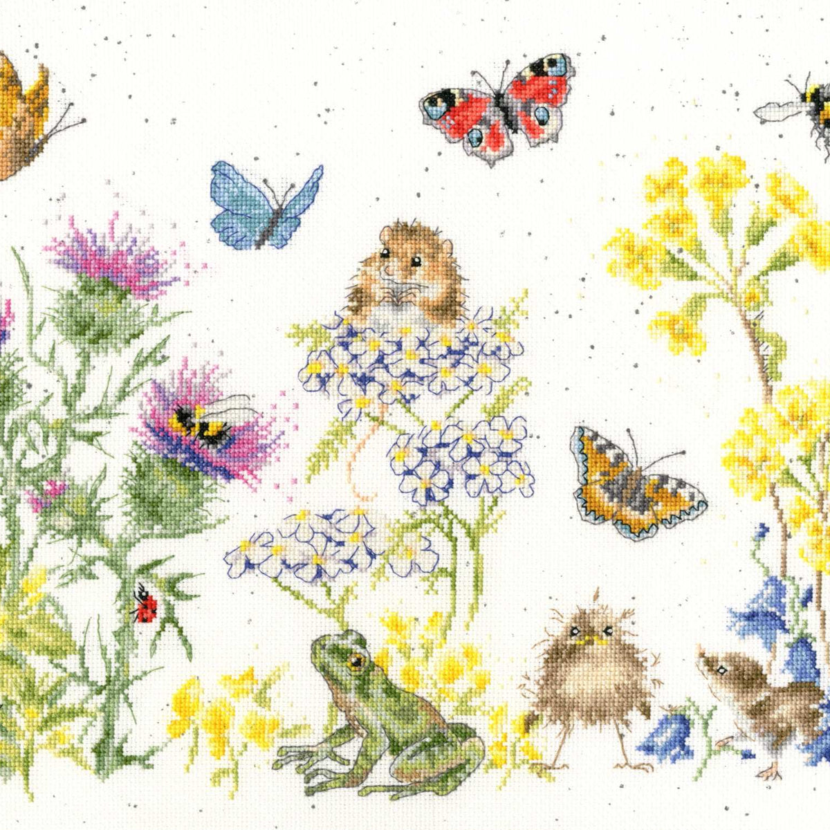 Wildflower Memories Cross Stitch Kit featuring detailed flowers, butterflies, frog, bird, and a mouse embroidery on 16 count aida fabric