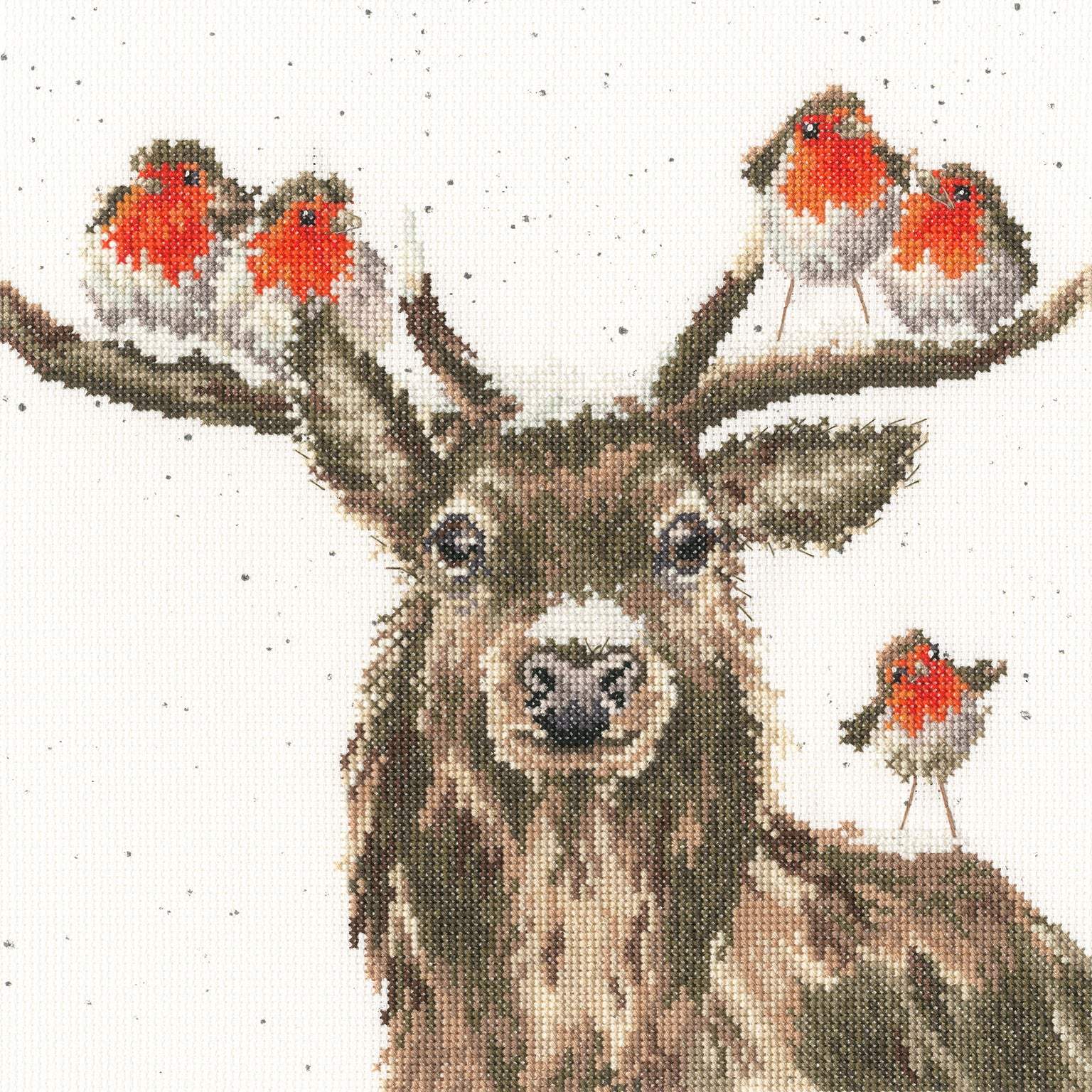 Festive Friends Cross Stitch Kit featuring a stitched deer with robins on antlers on speckled background