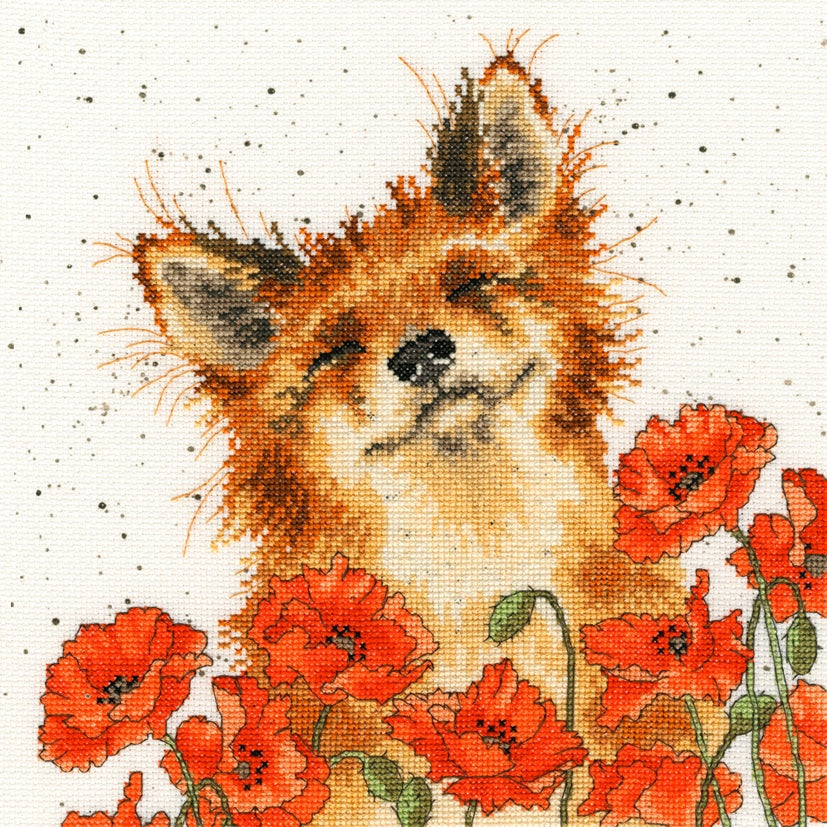 Fox surrounded by red poppies in counted Poppy Field Cross Stitch design by Bothy Threads
