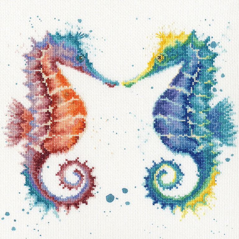 Colorful seahorses cross stitch kit design with blue bubble background from Bothy Threads