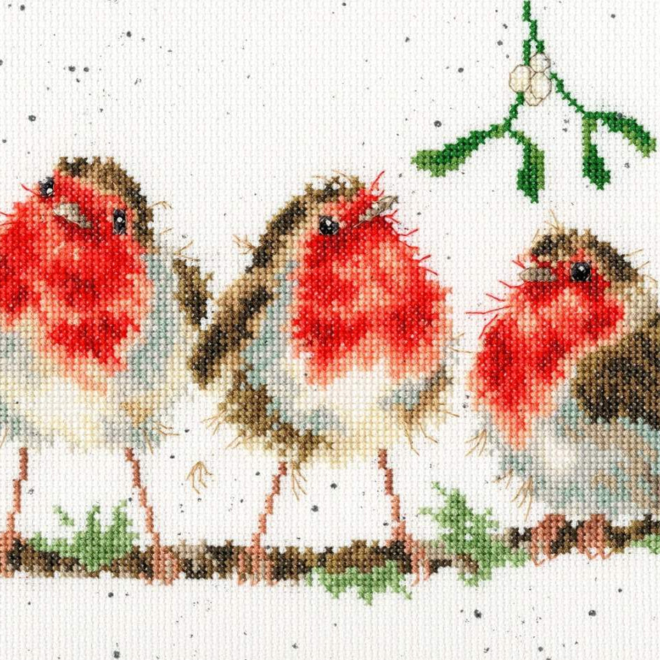 Rockin' Robins Cross Stitch Kit featuring five cross-stitched robins on a branch with mistletoe above on speckled 14 count Aida fabric