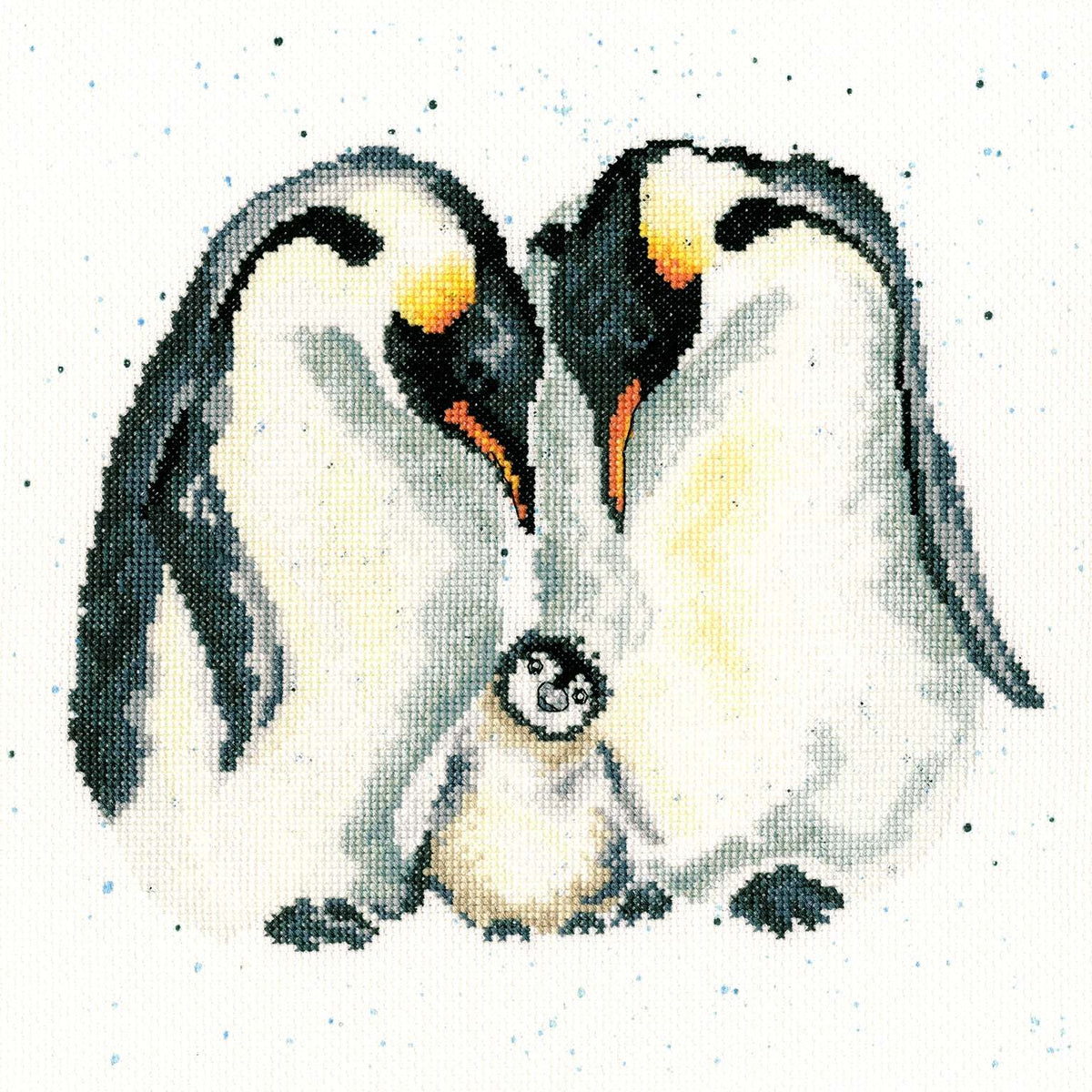 The Emperor's New Chick counted cross stitch kit featuring two penguins and a chick designed by Hannah Dale