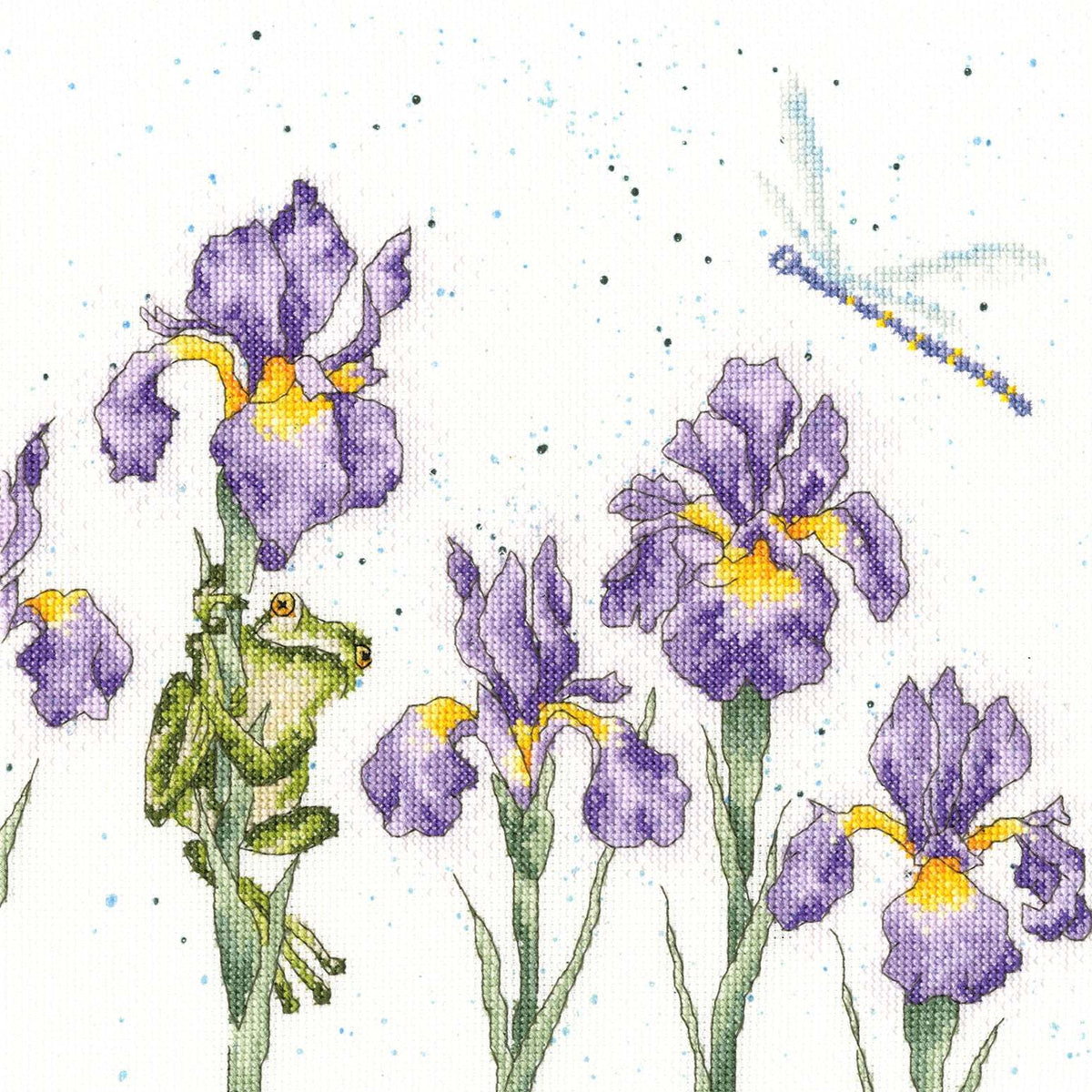 Damsels And Dragons cross stitch pattern with irises, frog, and dragonfly on speckled fabric background
