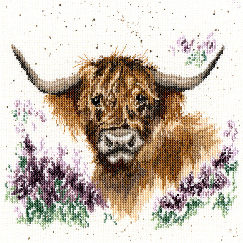 Highland Heathers Cross Stitch Kit featuring a highland cow among purple heather flowers