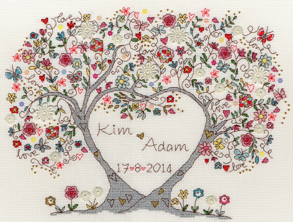 Love Blossoms Cross Stitch Kit featuring floral heart tree design with names and date on 14 count Aida fabric