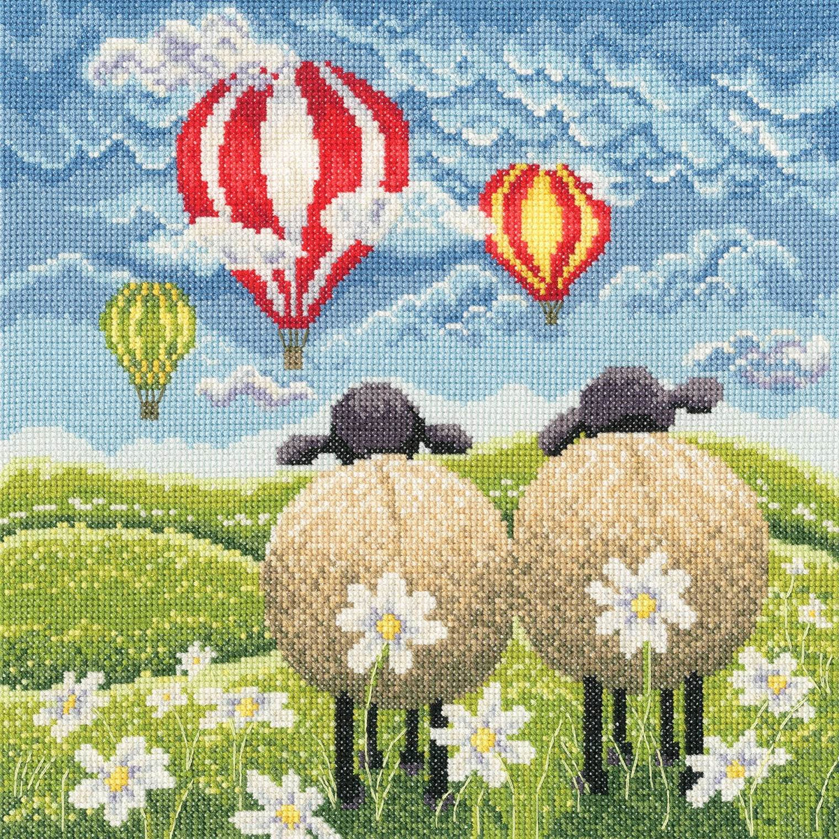 Cheeky Escape Cross Stitch Kit featuring two sheep, hot air balloons, and a scenic landscape with daisies.