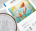 Mermaid Dreams Cross Stitch Kit with 16 count Zweigart aida and pre-sorted cottons showing finished mermaid design