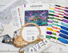 Celestial Isles Cross Stitch Kit with 16 count white Aida fabric and pre-sorted cotton threads