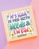 Needle and thread cross stitch kit with 14 count white Aida cloth and sewing supplies