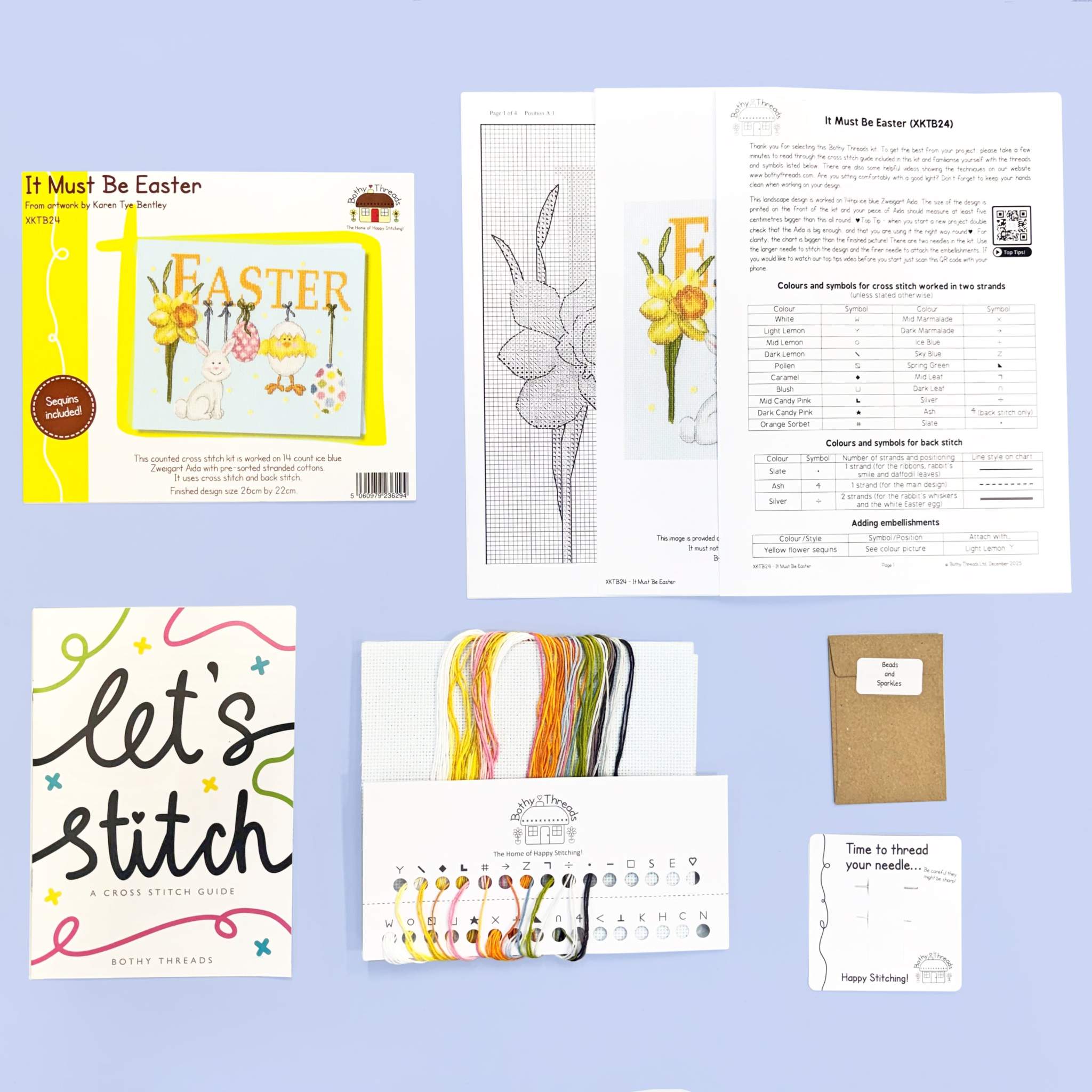 It Must Be Easter cross stitch kit with ice blue fabric, yellow sequins, and needle for 14 count stitching
