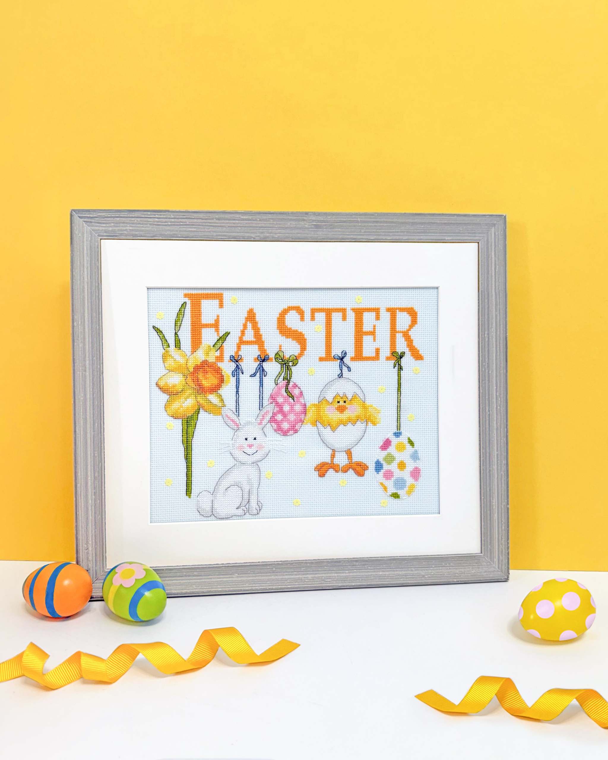 It Must Be Easter cross stitch kit with ice blue Aida fabric and yellow sequins