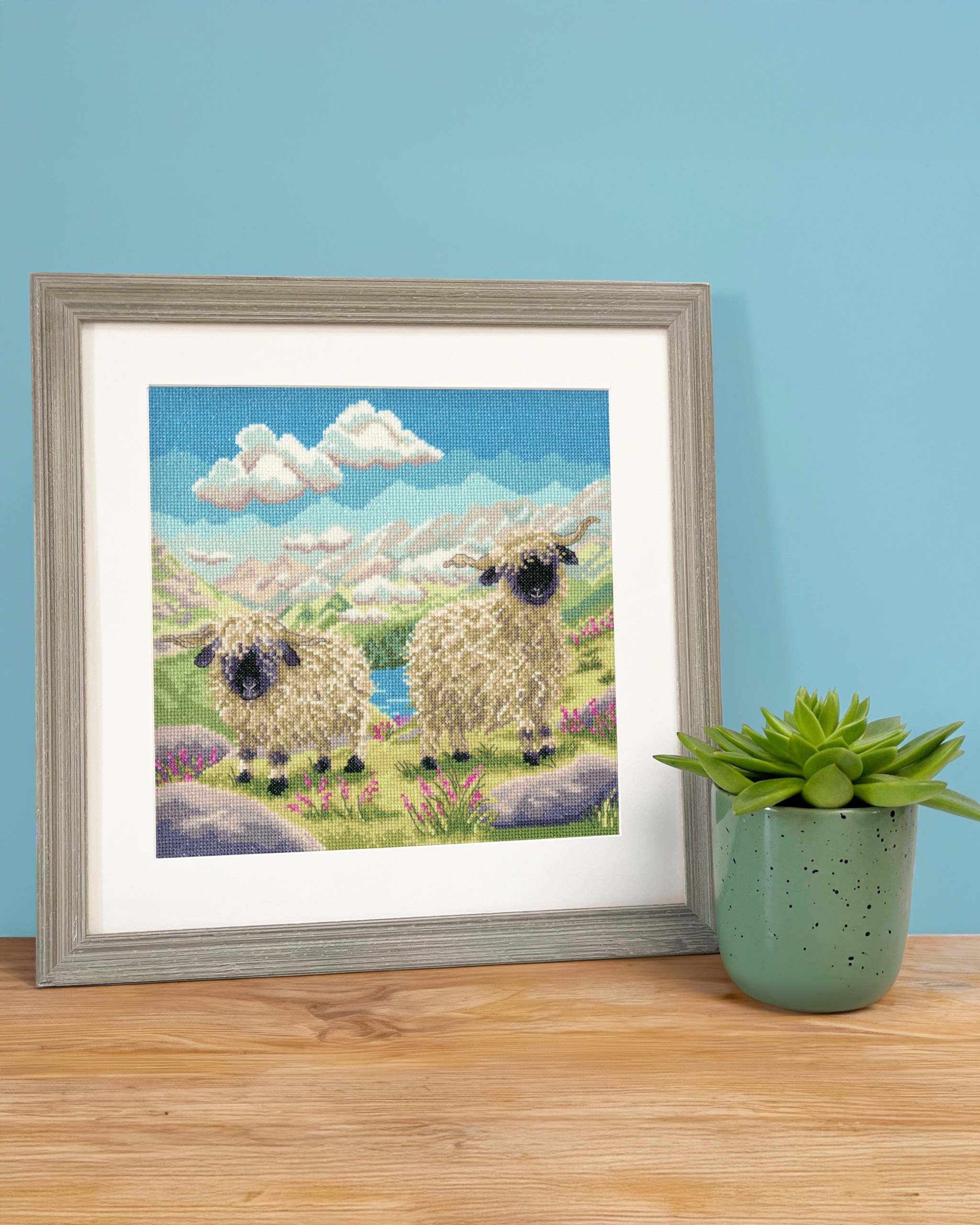 Finished Spag and Hetti sheep cross stitch design by Bothy Threads shown framed