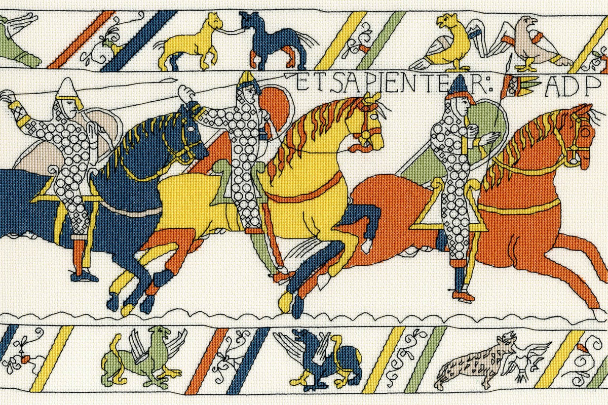 Bayeux Tapestry cavalry scene cross stitch kit featuring knights on horses in armor