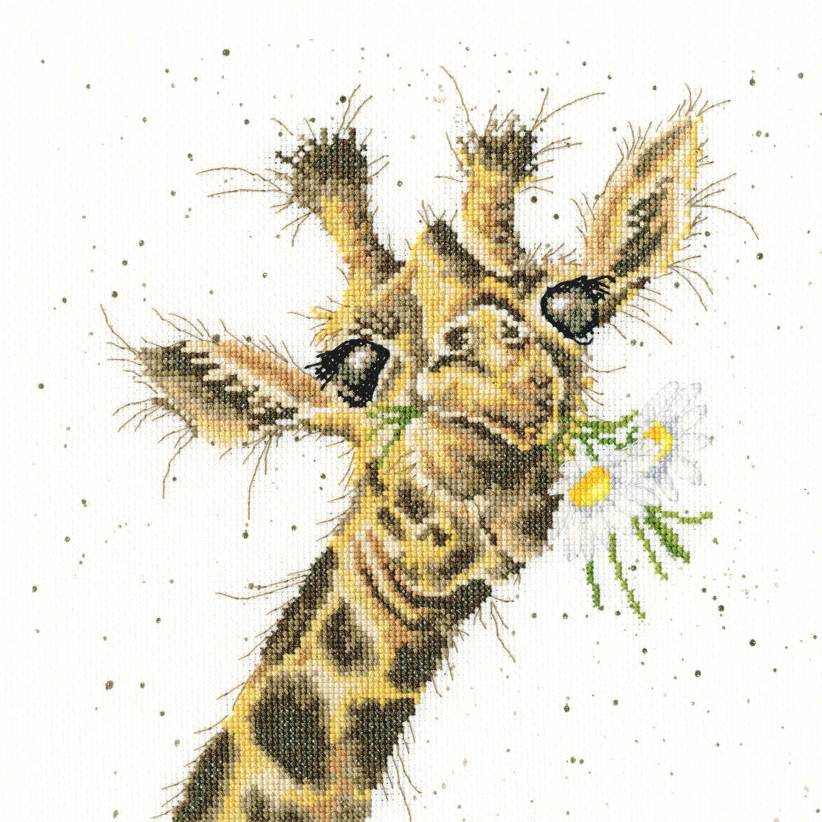 Thanks a Bunch Cross Stitch Kit featuring a giraffe holding daisies cross stitched on speckled Aida fabric